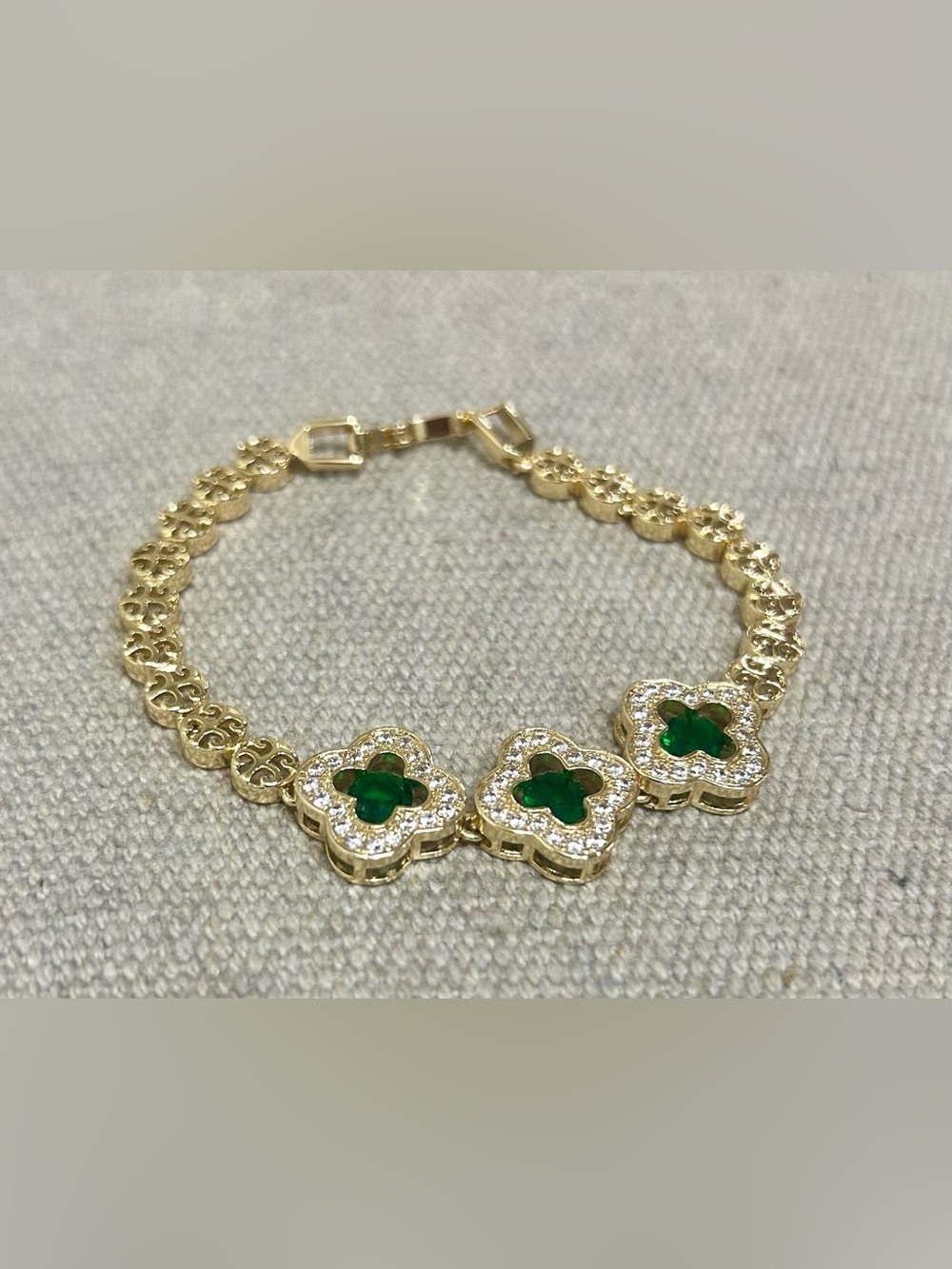 Gold-Plated Bracelet with Emerald Green Clover Accents